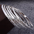 Pulsera de plata con diseño de círculos geométricos