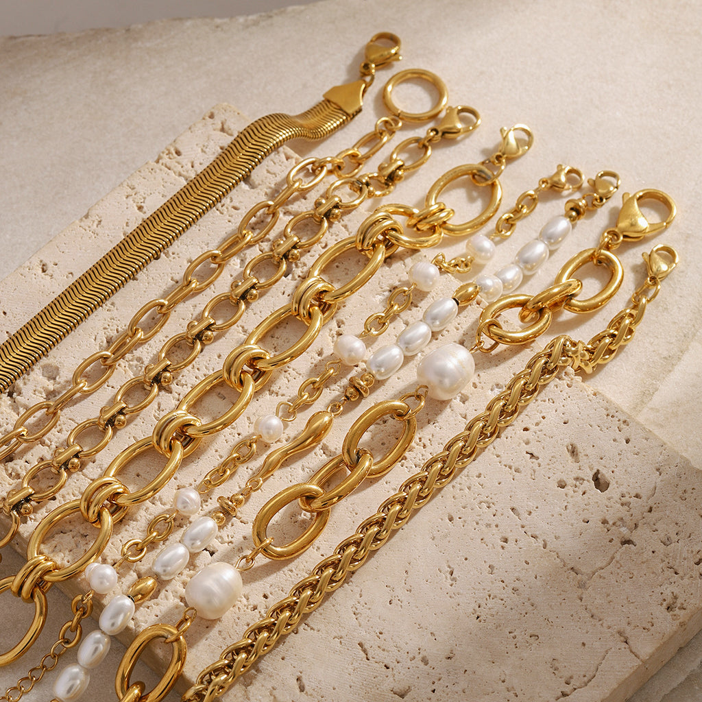 Damen-Armband aus Edelstahl mit Goldperle
