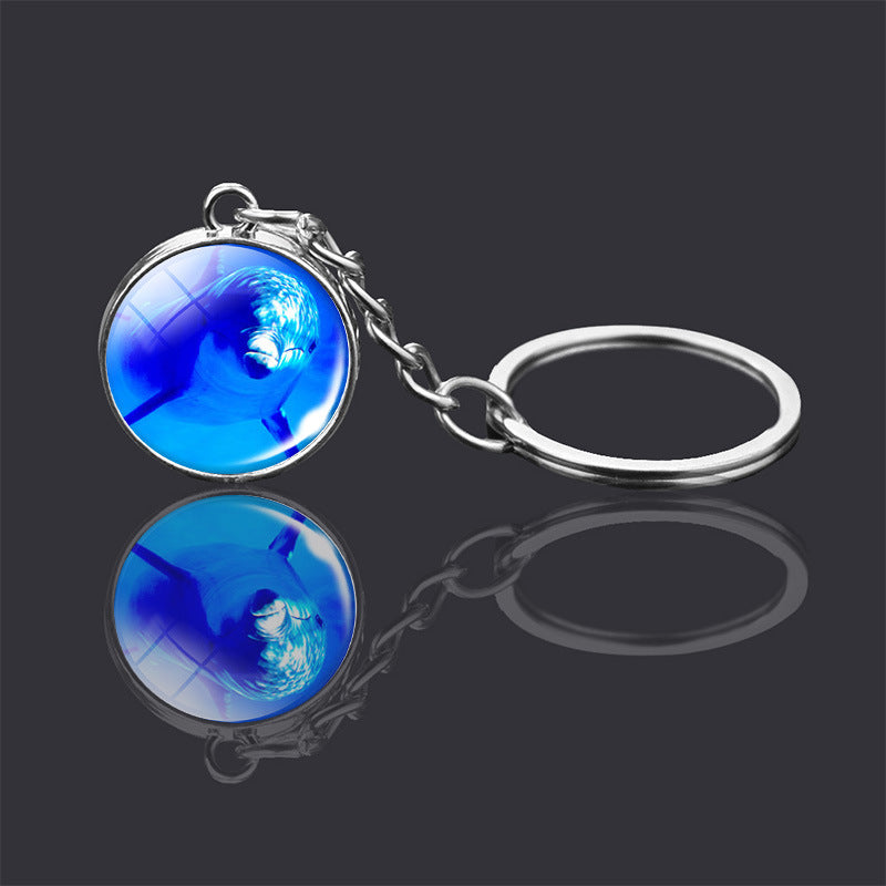 Adorno de llavero de bola de cristal de doble cara con animal