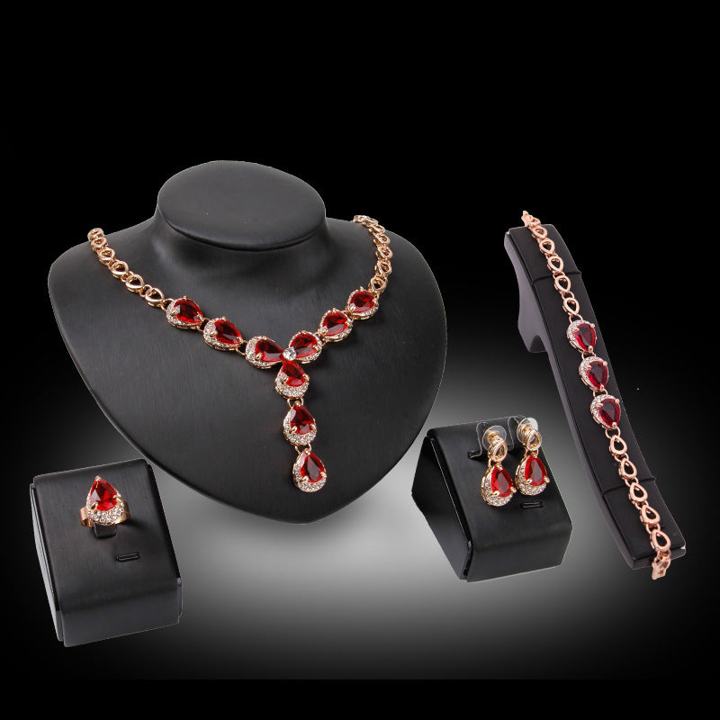 Charmantes rotes Edelstein-Schmuckset vierteilig Europäische und amerikanische Hochzeitsaccessoires